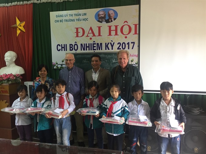 two americans open educational foundation helping vietnamese fatherless children