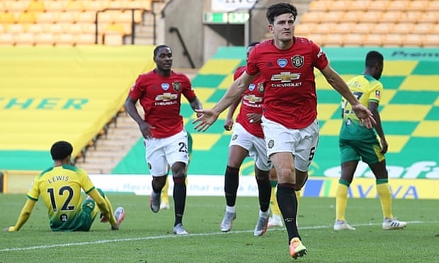 Harry Maguire celebrates scoring of Manchester United’s second and decisive goal in their FA Cup quarter-final at Norwich. Photograph: Matthew Peters/Manchester United/Getty Images